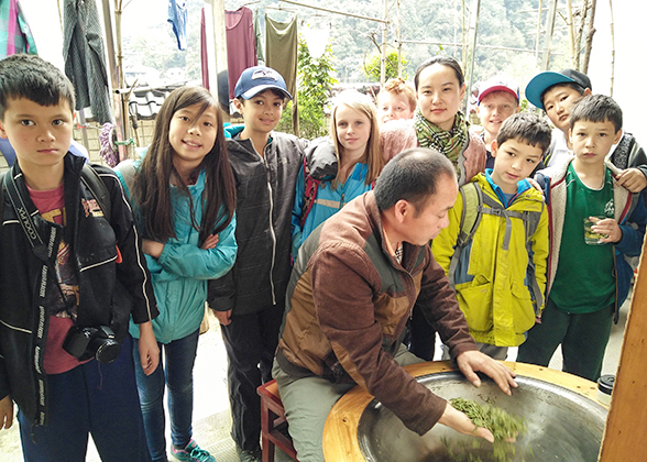 Children Learning to Make Tea