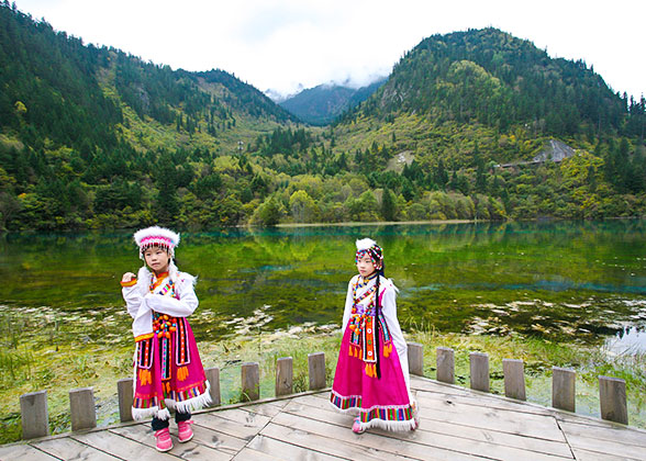 Tourists Wearing Tibetan-style Clothes in Jiuzhaigou